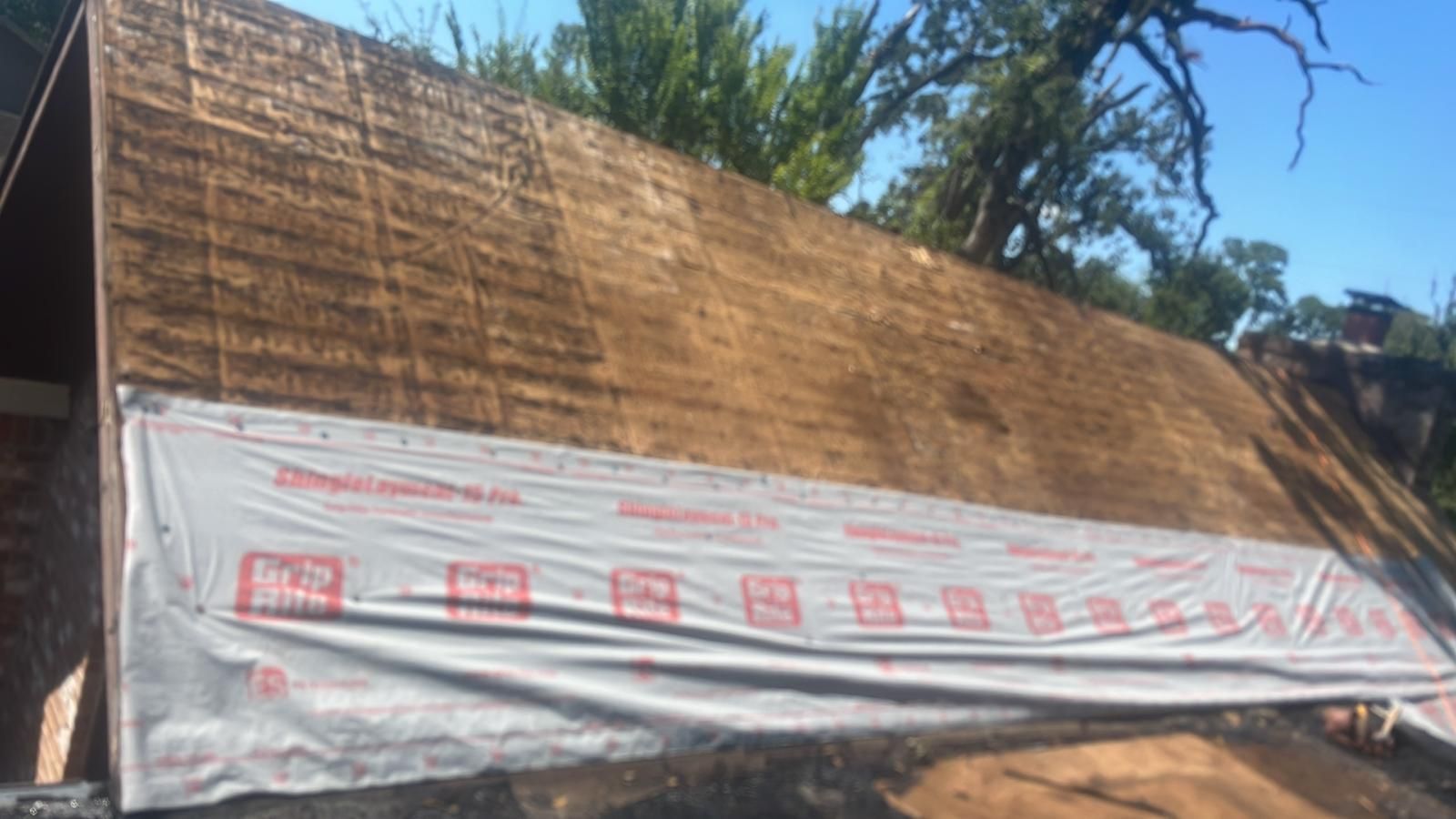 Roofing project: OSB sheathing with underlayment installed, ready for shingles.
