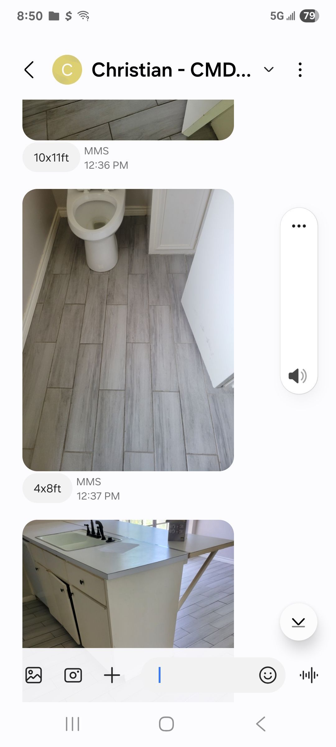 Bathroom with white toilet and wood-look flooring. White cabinets and countertop visible.