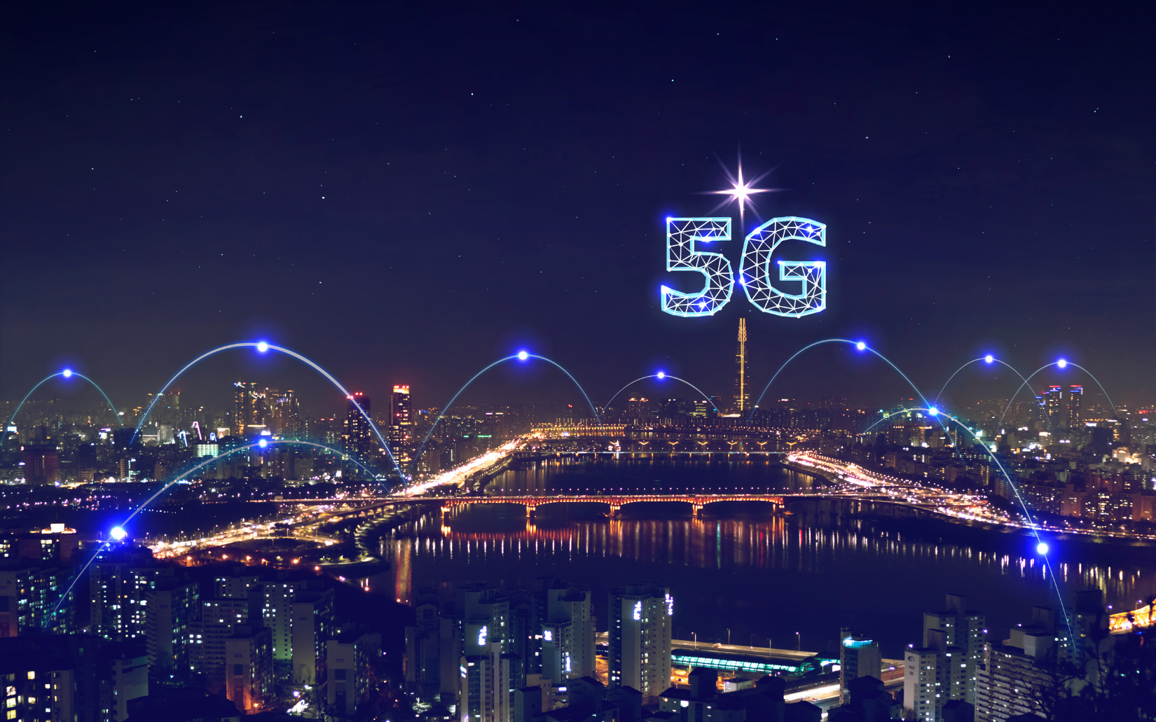 Cityscape at night with the glowing 5G symbol overhead, connected by blue lines.