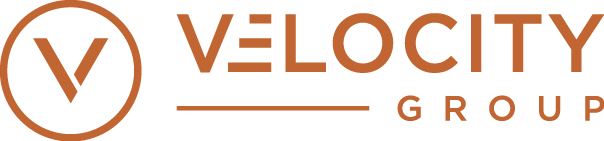 Velocity Group logo in orange with a stylized V inside a circle and the company name beside it