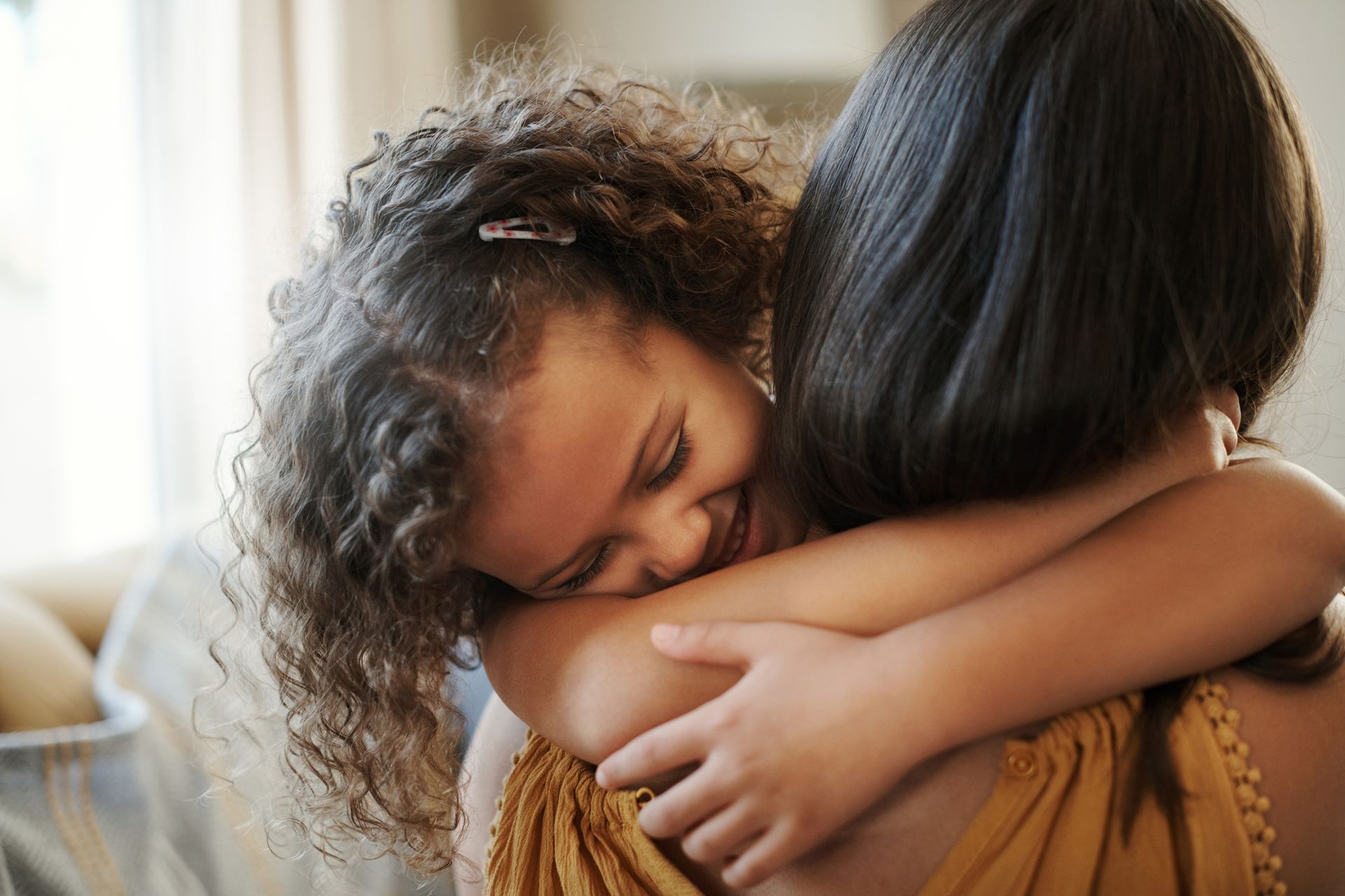 A group of people are standing in the middle of a canyon.