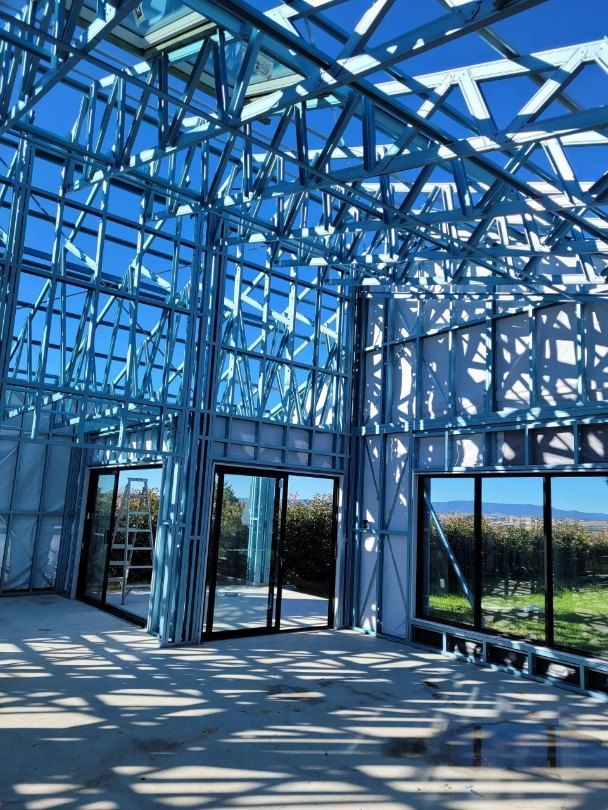 The Inside of a Building Under Construction With a Blue Sky in the Background — Chandolin Construction in Bathurst, NSW