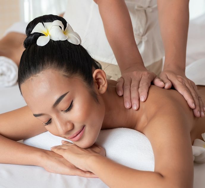Woman Having Back Massage — Denver, CO — Individualized Massage Inc.