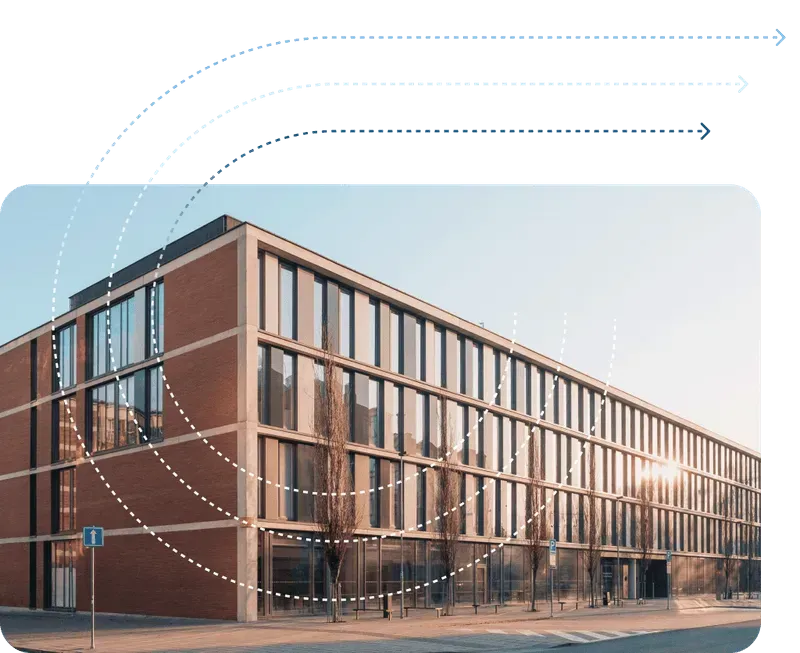 Modern brick building with glass windows, dotted lines emanating from it.