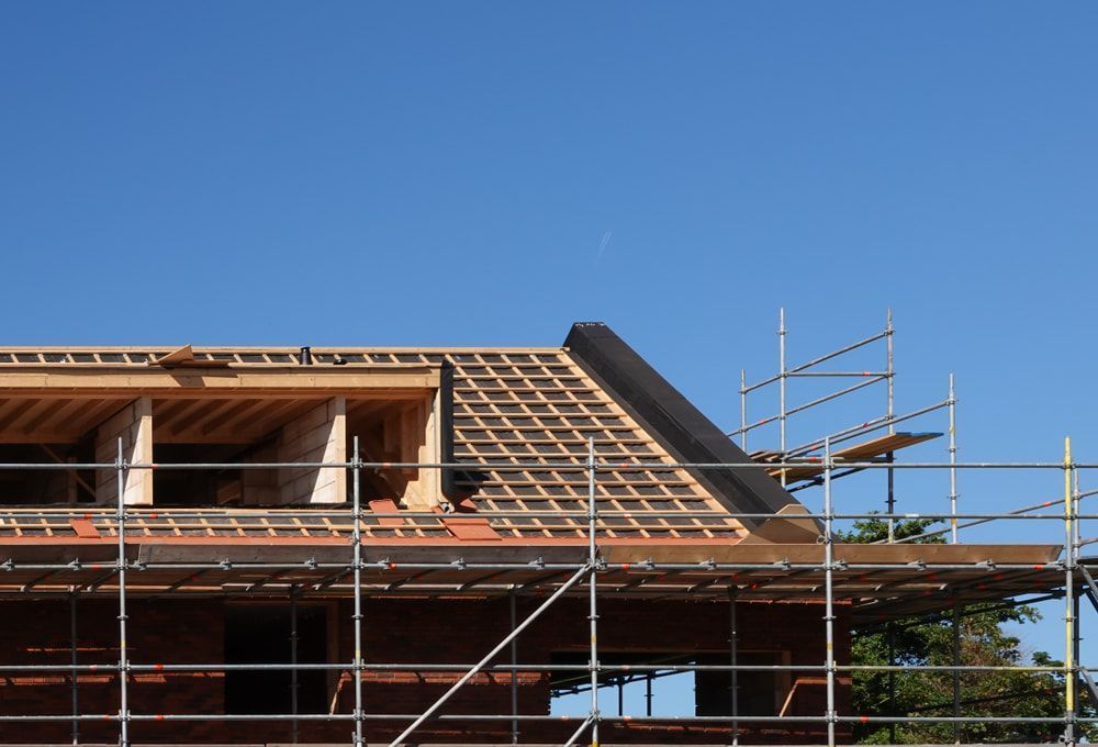 A House In Construction With Blue Skies Behind It — Burton Group In Ciccone, NT