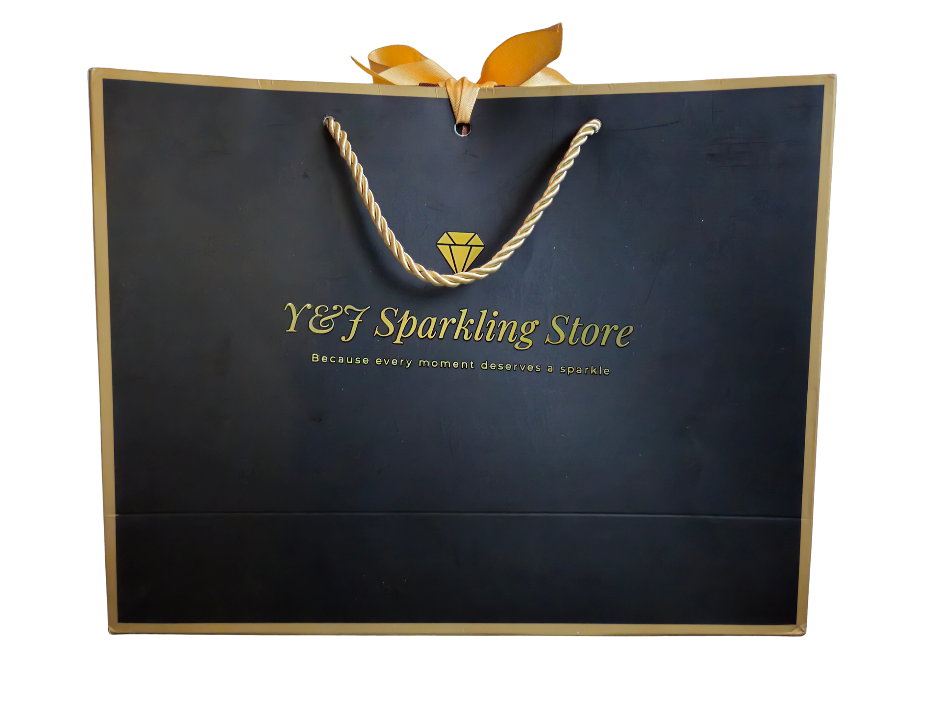 Zwarte boodschappentas met gouden bies, handvatten en logo van