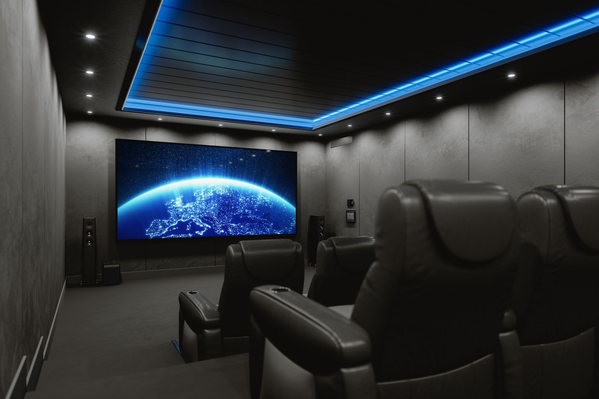 A living room with a couch , television , speakers and a flat screen tv.
