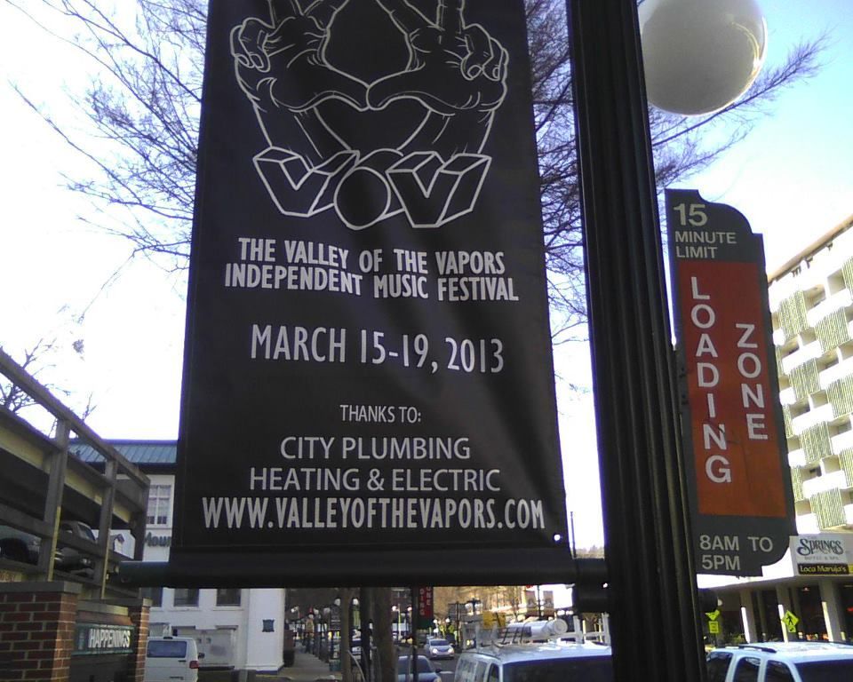 A sign for the valley of the vapors independent music festival