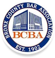 The bronx county bar association logo is a blue and orange circle with a building in the center.