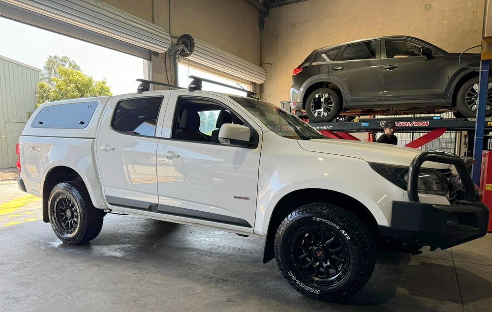 Truck Parked Inside A Garage At A Tyre Shop