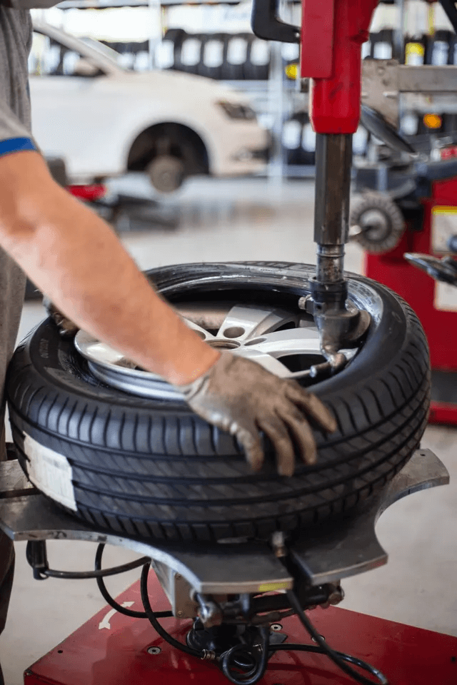 Man Changing Tires — Advance Tyres in Maryborough, QLD