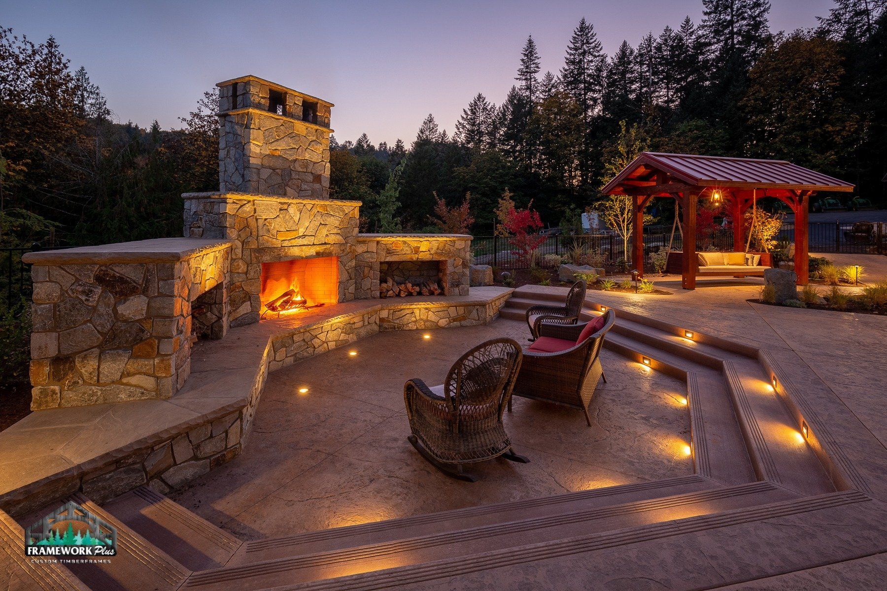 There is a fireplace in the middle of the patio.
