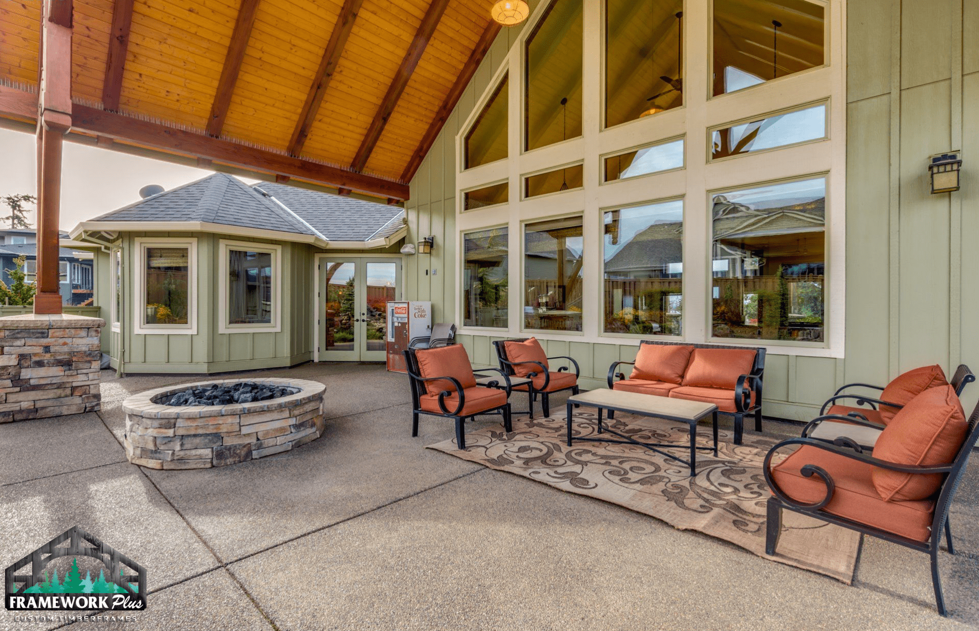 There is a fire pit in the middle of the patio.