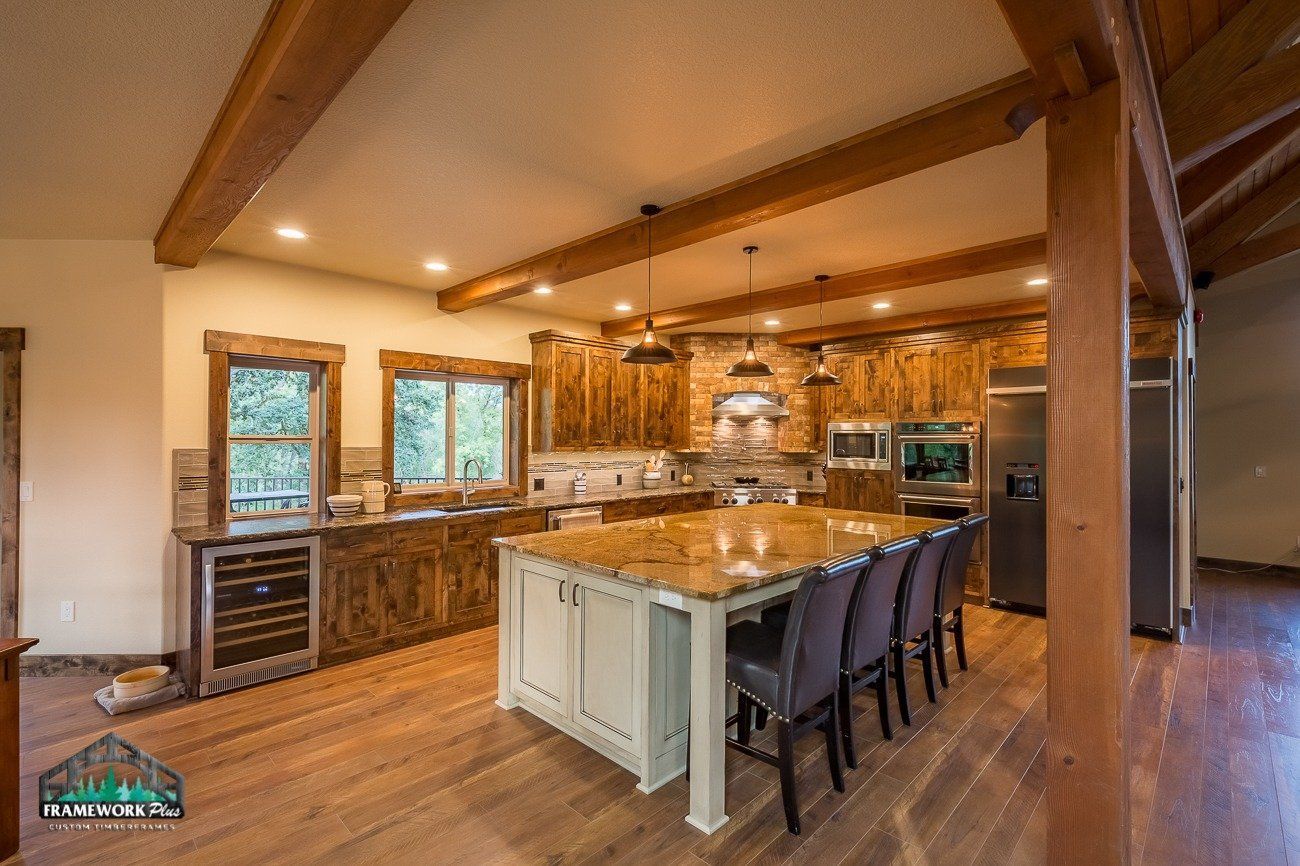There is a large island in the middle of the kitchen.