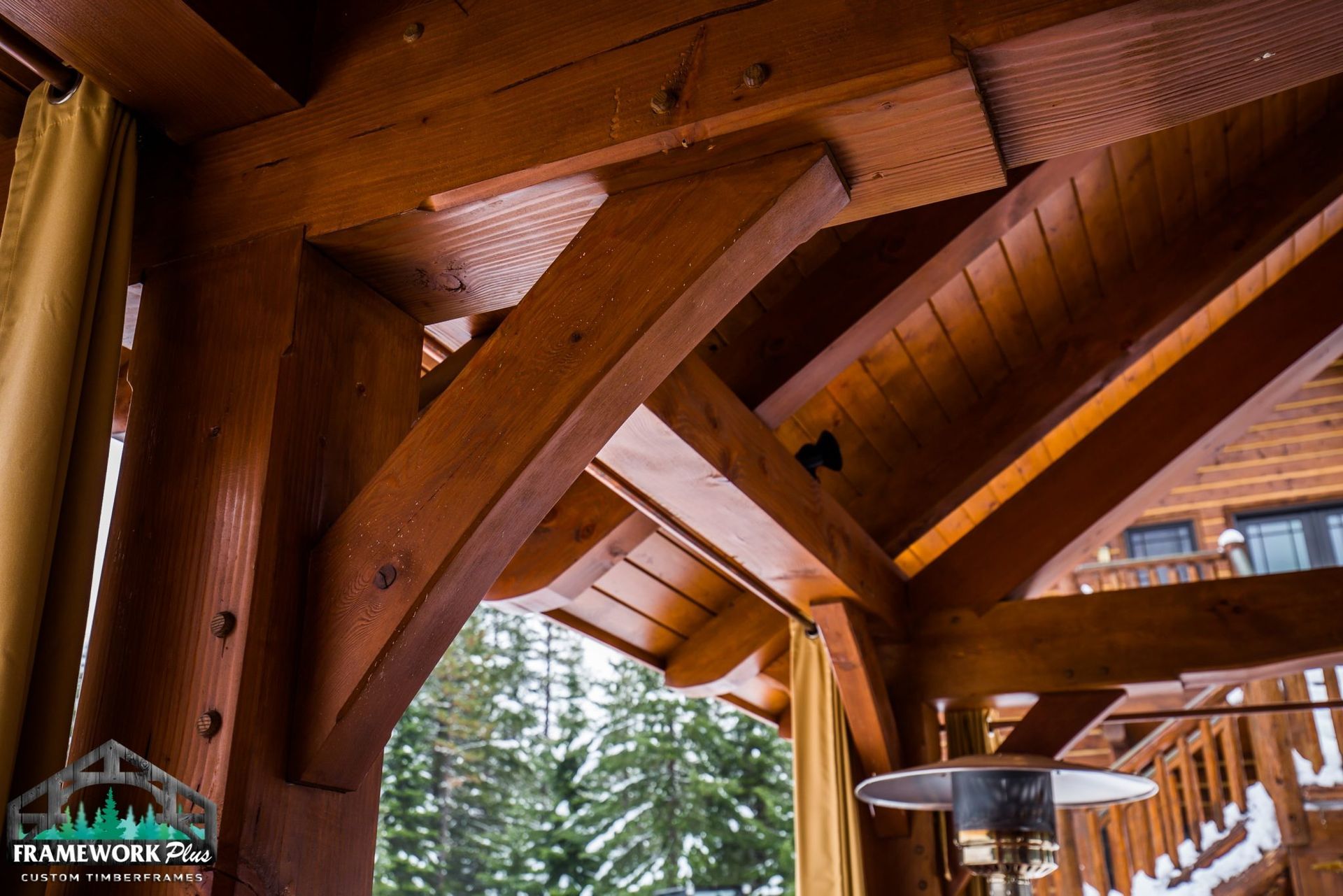 A close up of a wooden structure with a heater in the background.