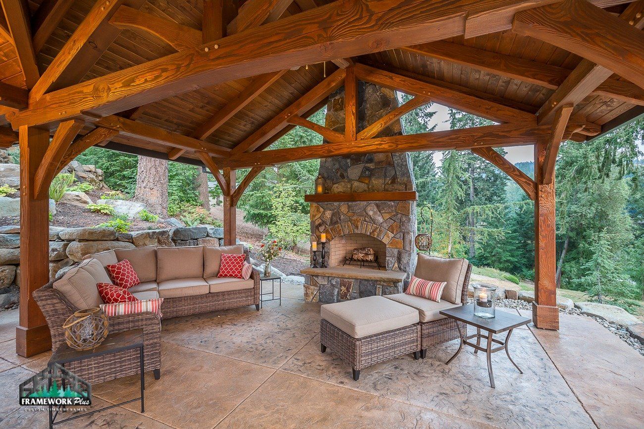 There is a fireplace in the middle of the patio area.