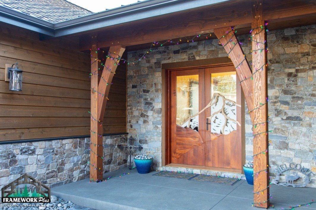 A house with a wooden porch and a wooden door