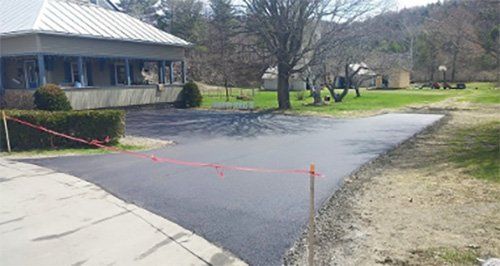 Roadway in Front of a House - Paving Contractor in Williamstown, VT
