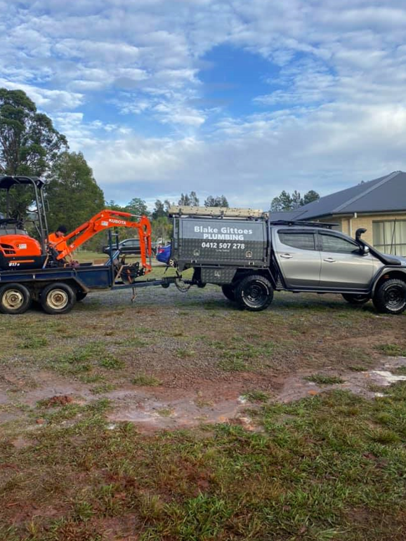 Gray Pickup Truck Towing a Trailer — B & A Plumbing & Gas In Wauchope, NSW