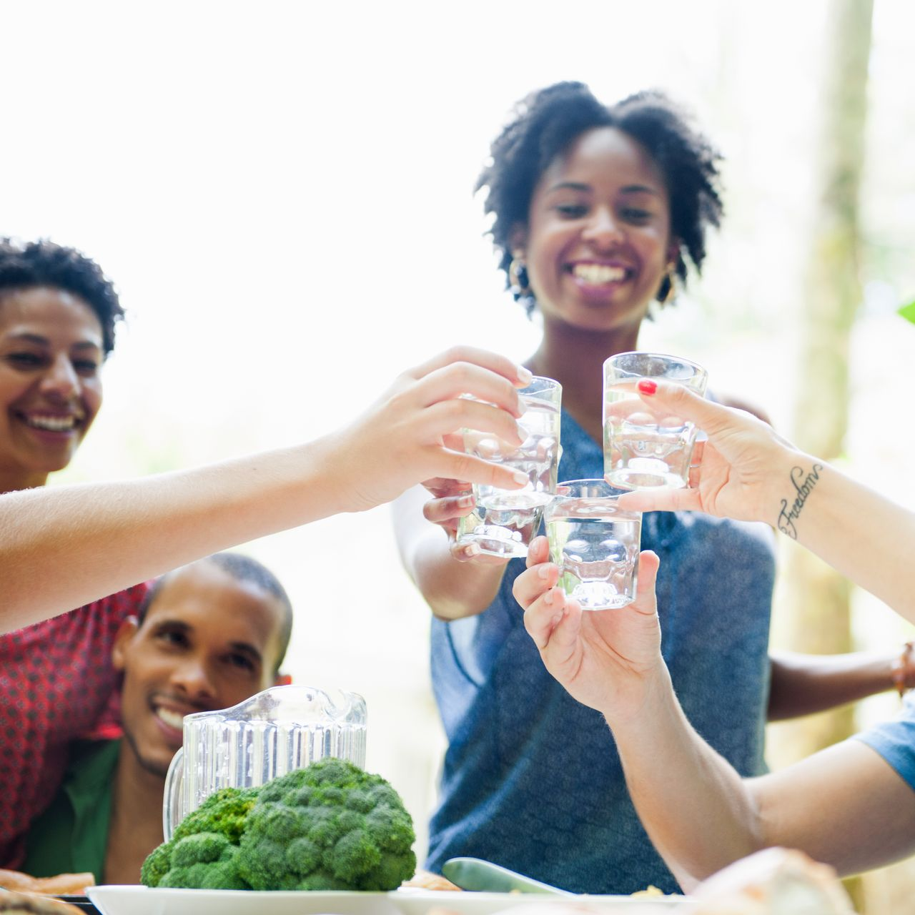 A brick building with a palm tree in front of it