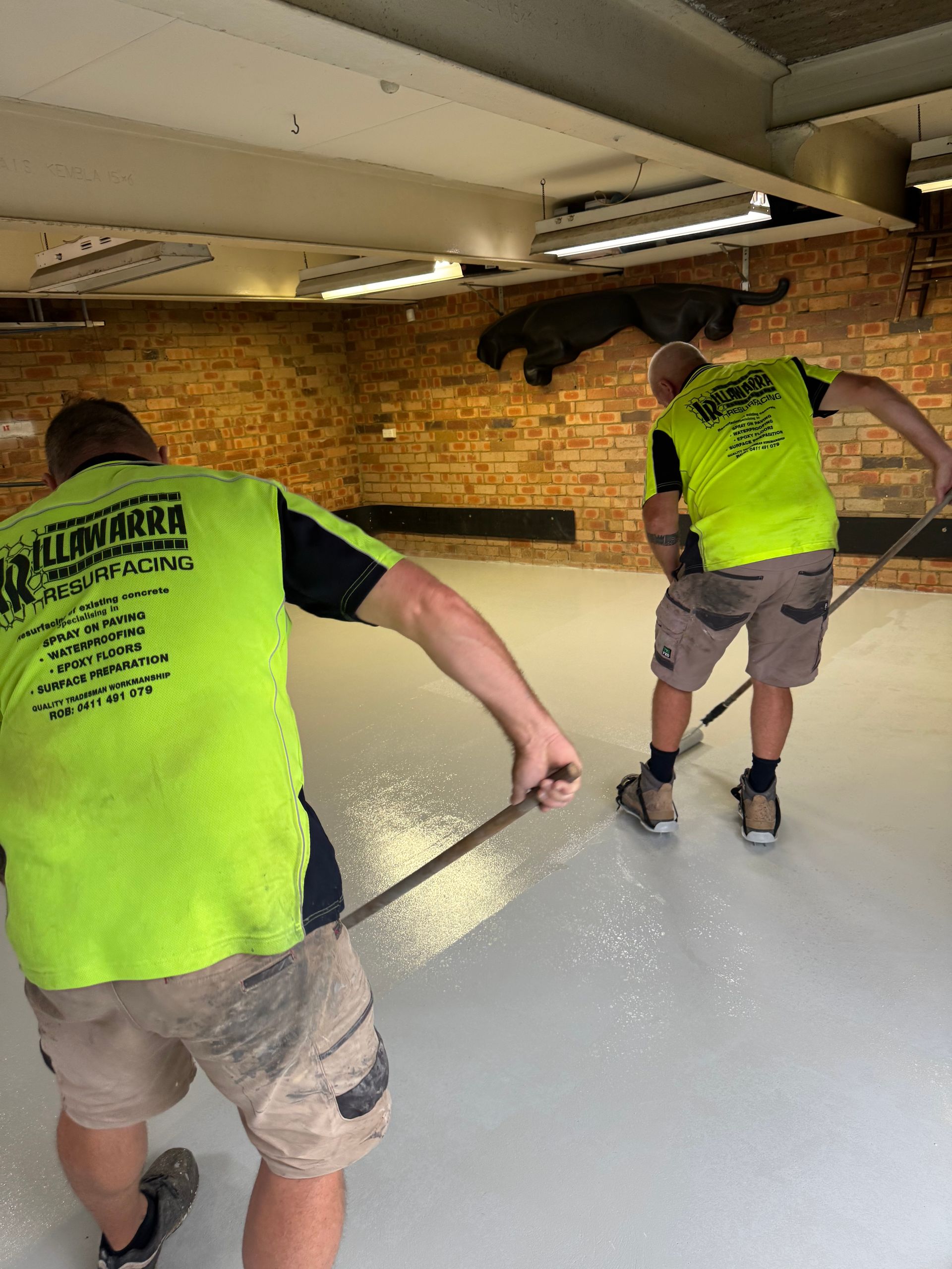 A Room with A Gray Floor and A Purple Blanket on The Wall — Illawarra Resurfacing Pty Ltd in Balgownie, NSW