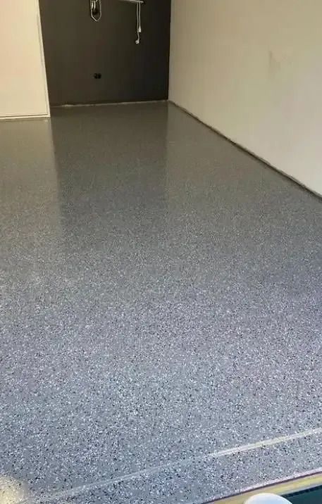 A Gray Concrete Floor in A Room with A Sink — Illawarra Resurfacing Pty Ltd in Balgownie, NSW