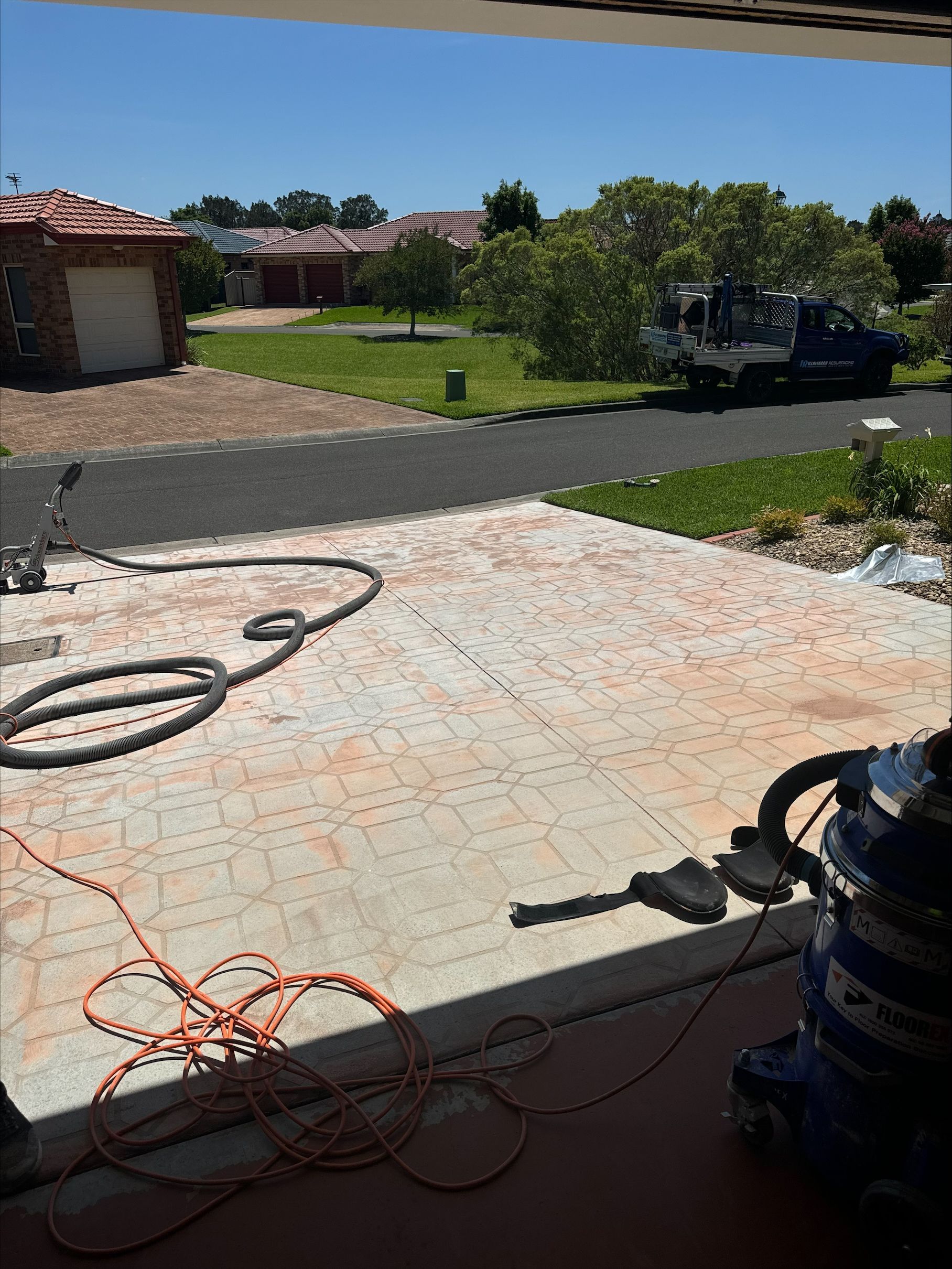 Surface Preparation In Front of a House — Illawarra Resurfacing Pty Ltd in Balgownie, NSW