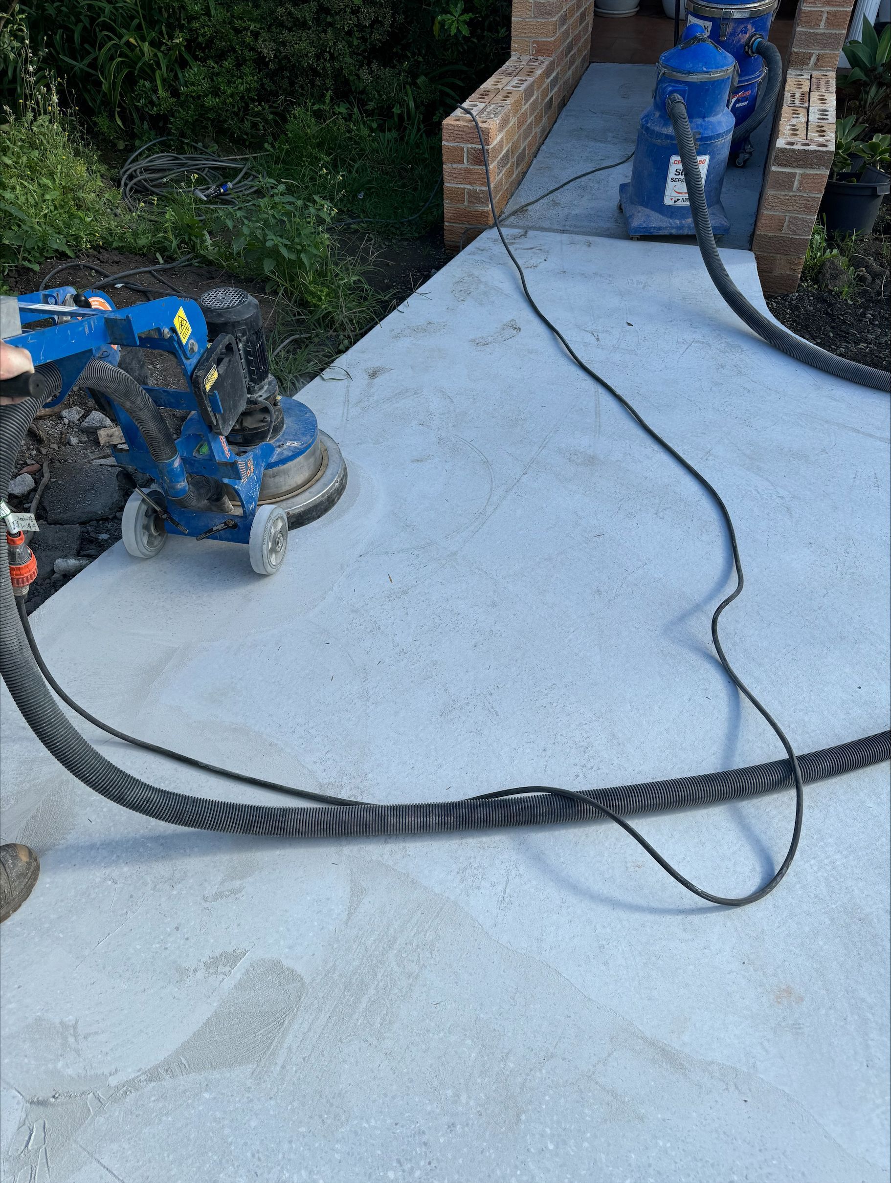 Surface Preparation with Tools in Front of a House — Illawarra Resurfacing Pty Ltd in Balgownie, NSW