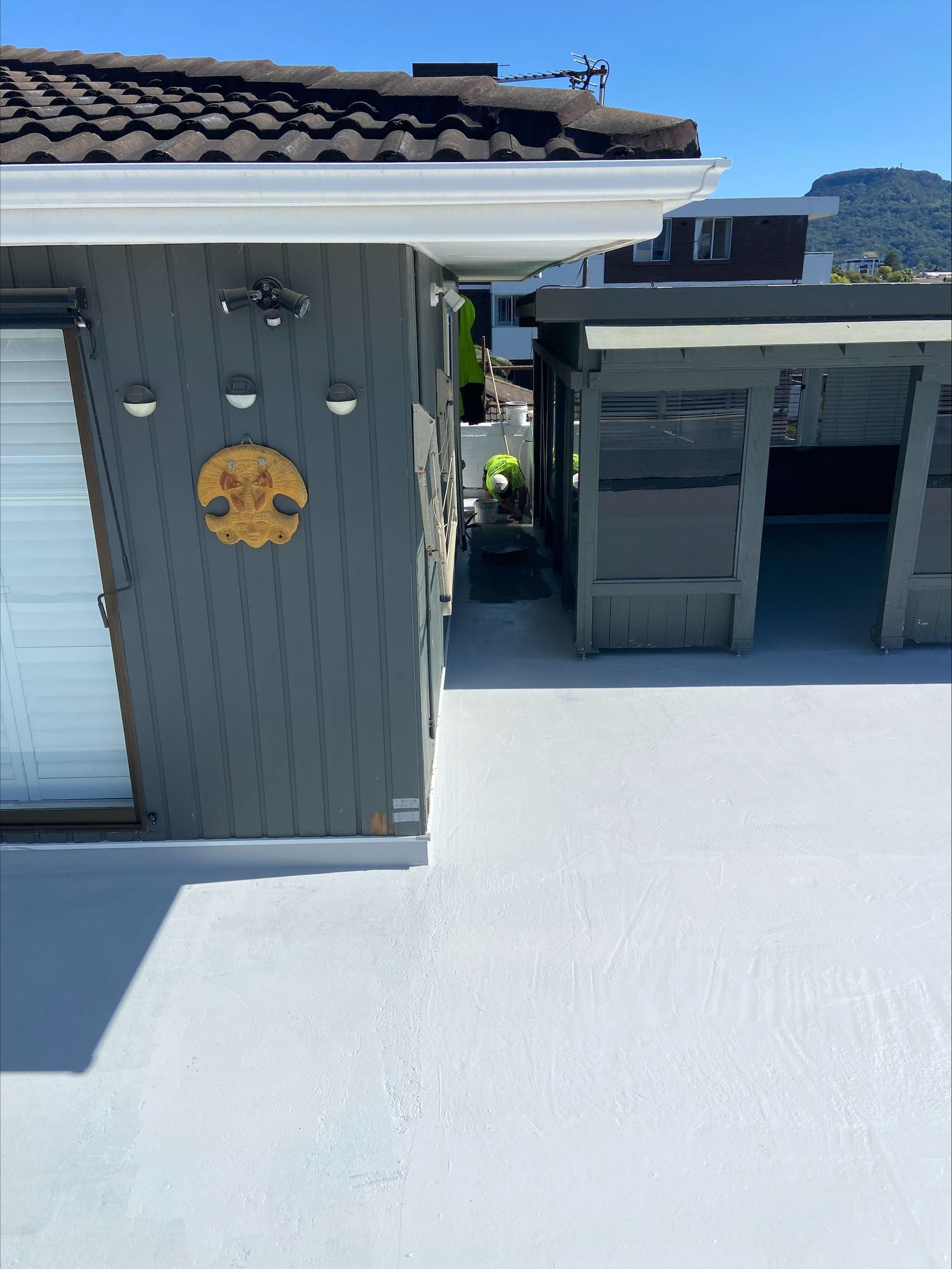 A Driveway With Finished Waterproofing — Illawarra Resurfacing Pty Ltd in Balgownie, NSW