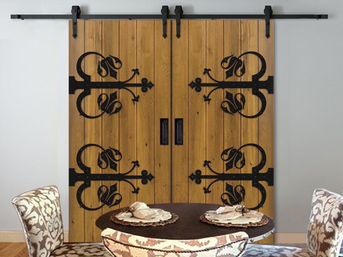 Accented Barn Doors in Dining Room with Black Hardware