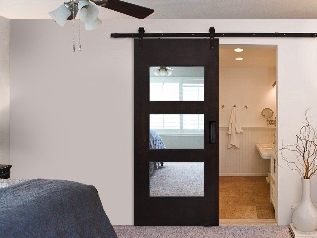 Mirrored Barn Door in Bedroom