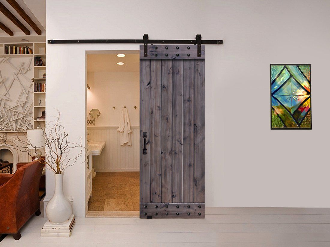 Grey Wood Barn Door Featuring Black Handle