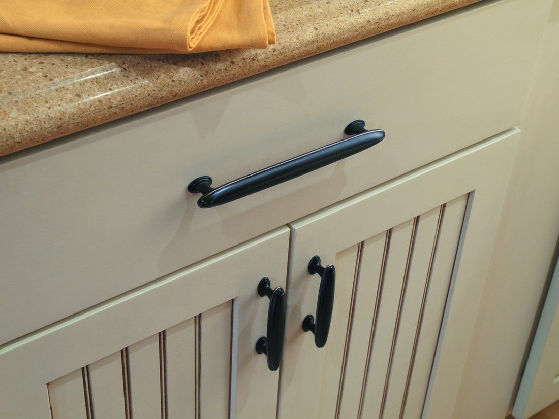 Beige cabinets with Black Hardware