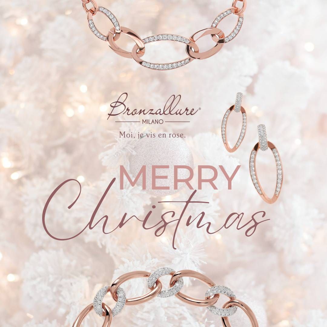 Parure de bijoux en or rose : collier, boucles d'oreilles et bracelet. Joyeux Noël. Fond blanc.