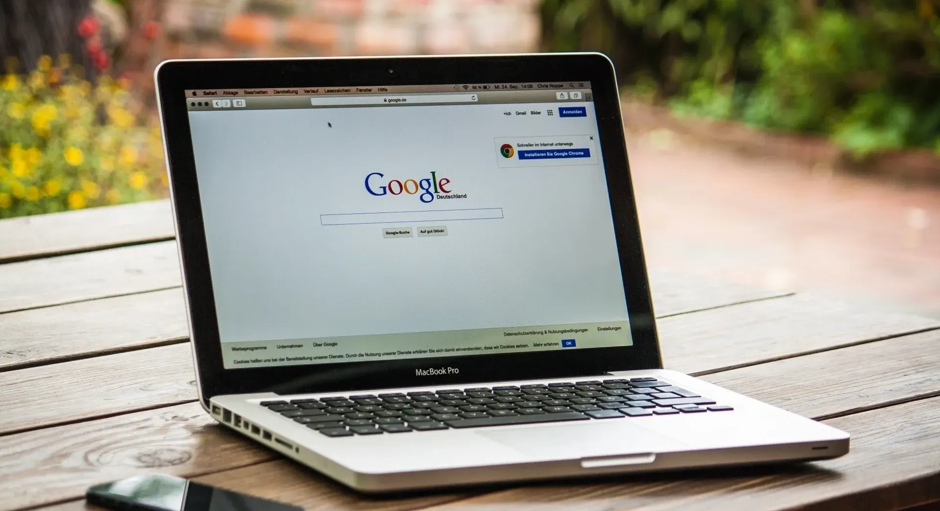 A laptop is open to a google search page