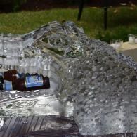 Outdoor ice sculpture with drink bottles inside