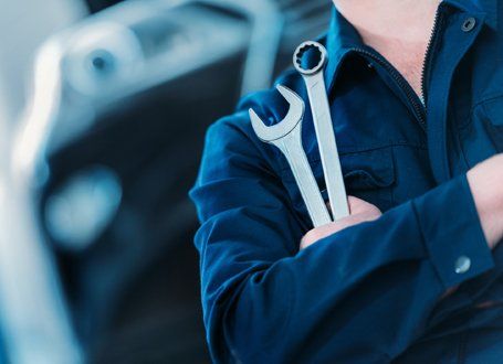 Oil Change — Repairman With Wrench And Ring Spanner in Antioch, CA