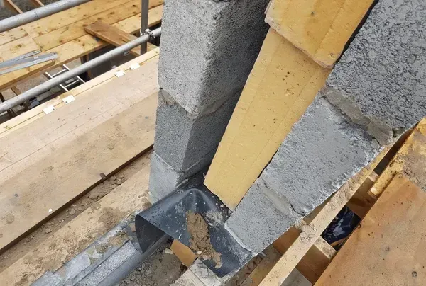 cavity wall with dpc under and insulation shown on site