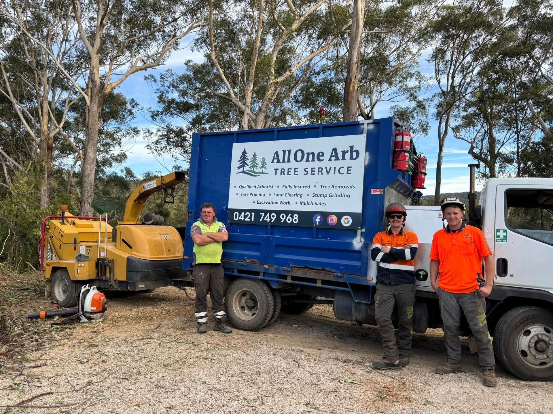 Company's truck with employees from All One Arb in front of it — All One Arb Tree Service In Bonny Hills, NSW