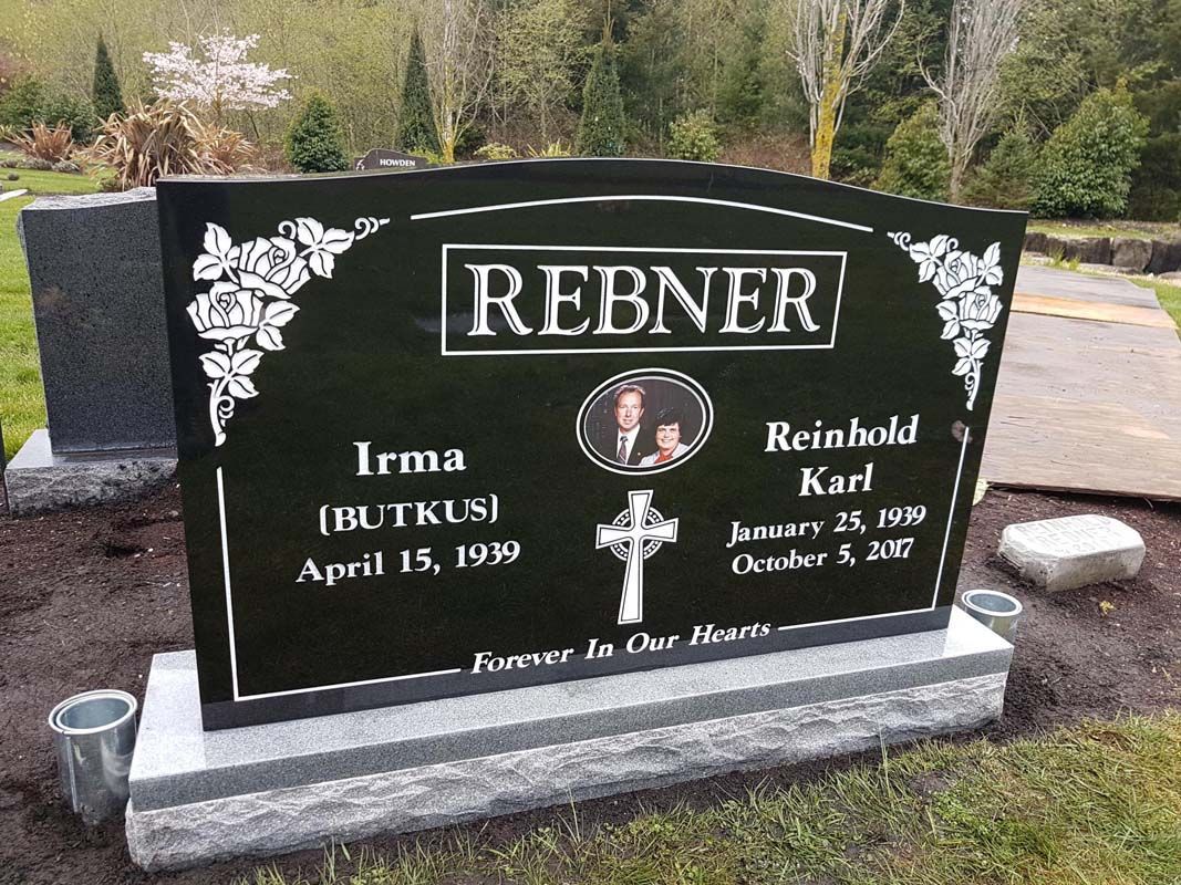 A black gravestone with the name rerner on it