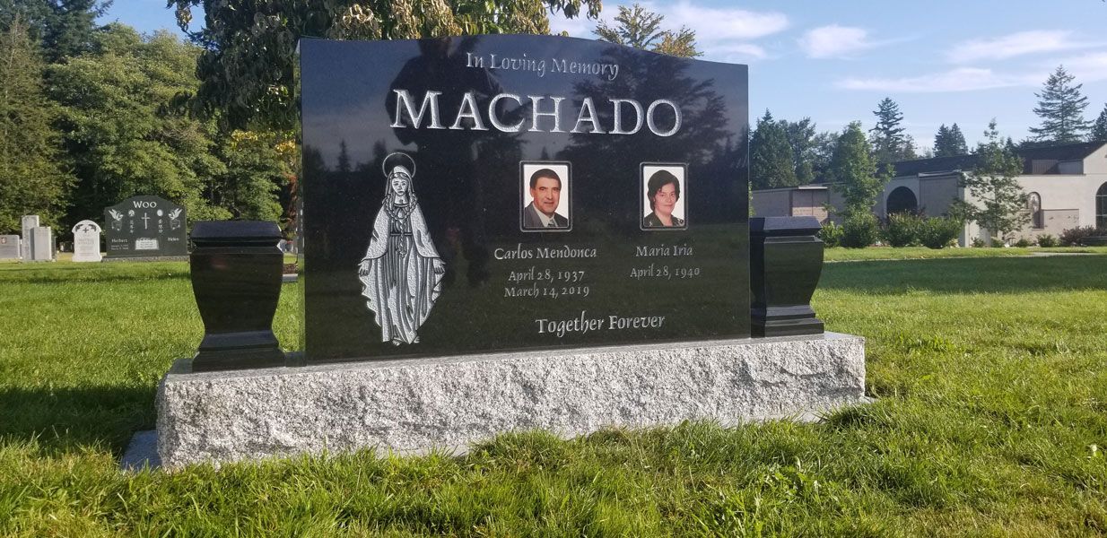 A gravestone in a cemetery with the name machado on it