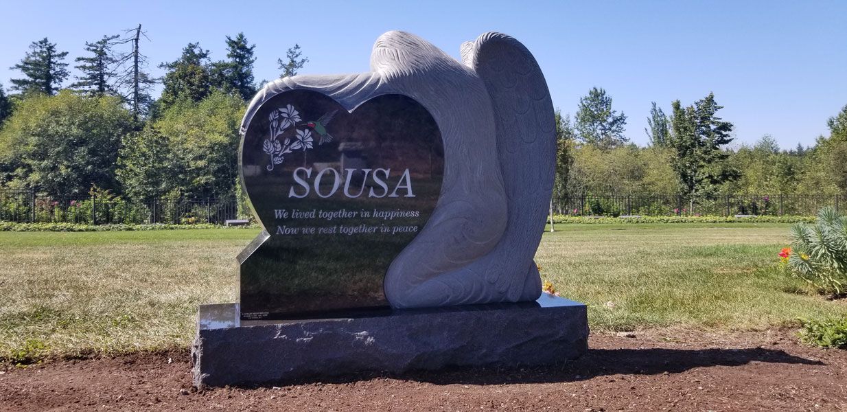 A gravestone with the name sousa on it