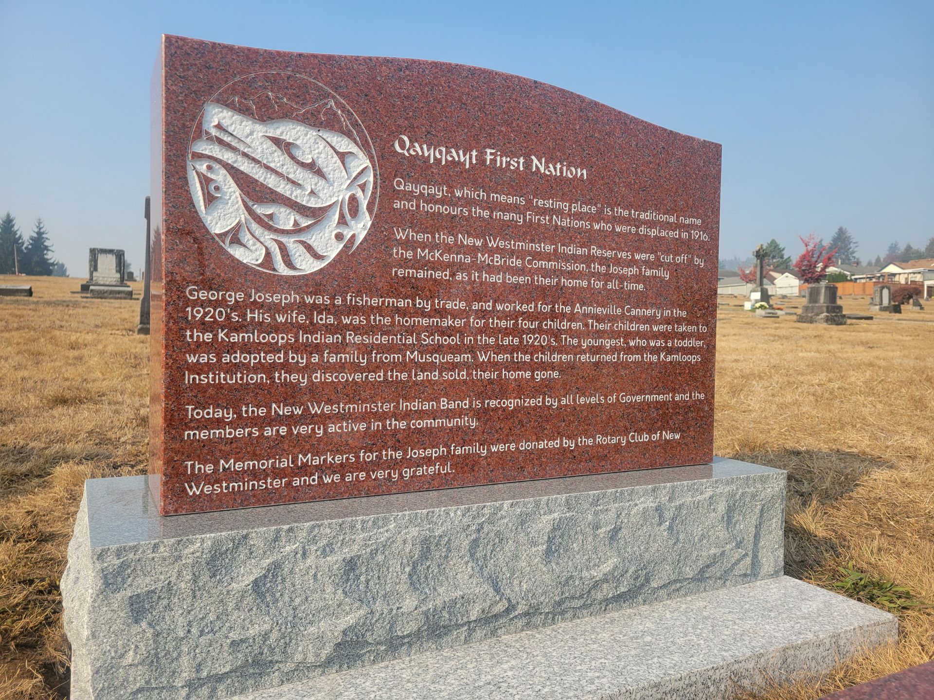 a granite upright marker for qayqayt first nations