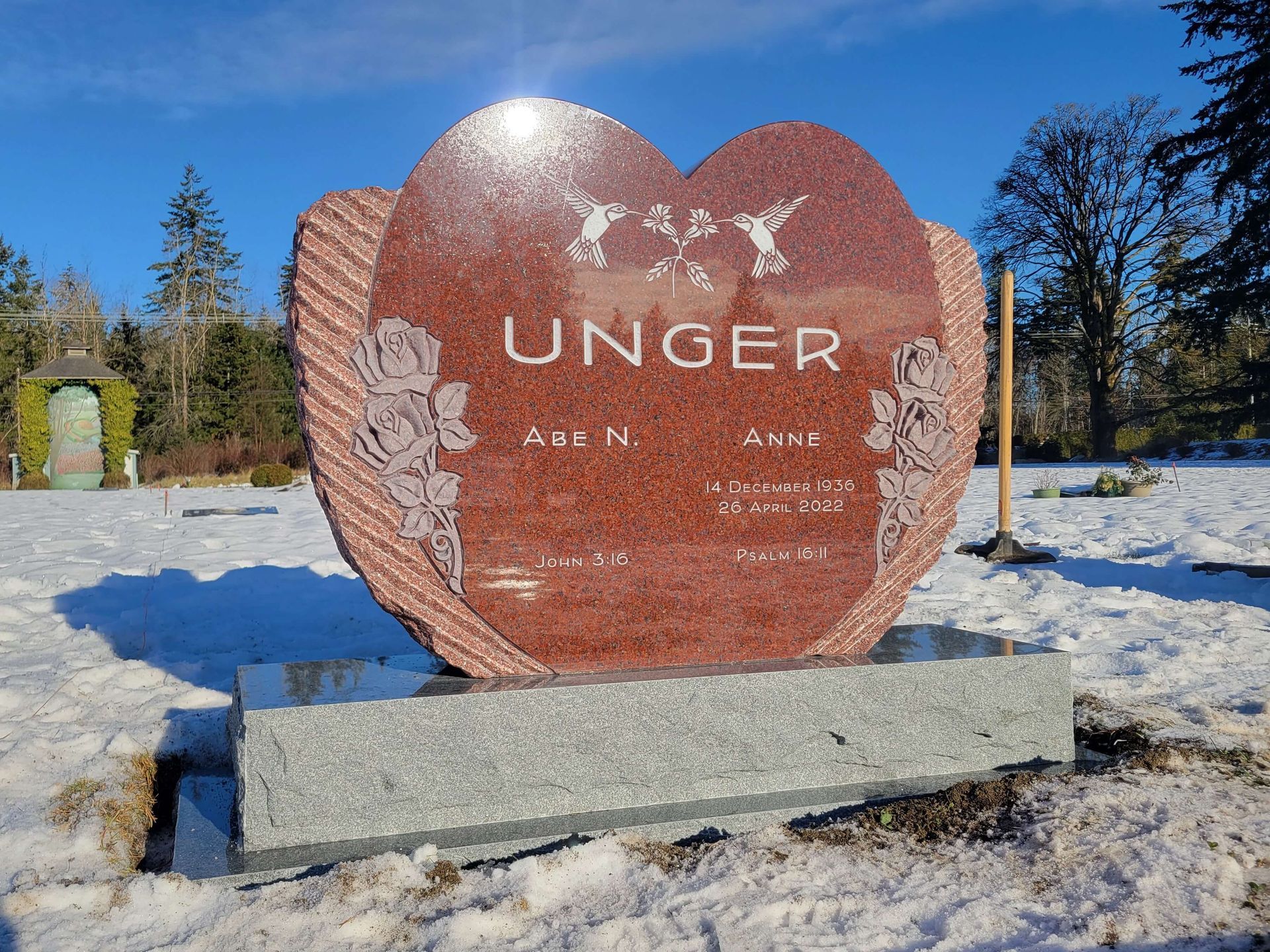 a heart shaped gravestone with the name unger on it