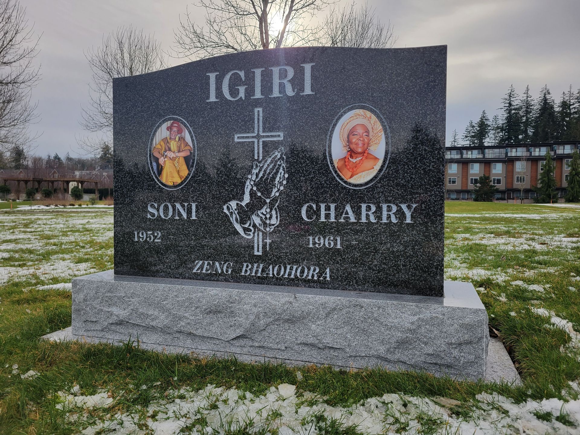 a gravestone for igiri soni and charry in a cemetery .