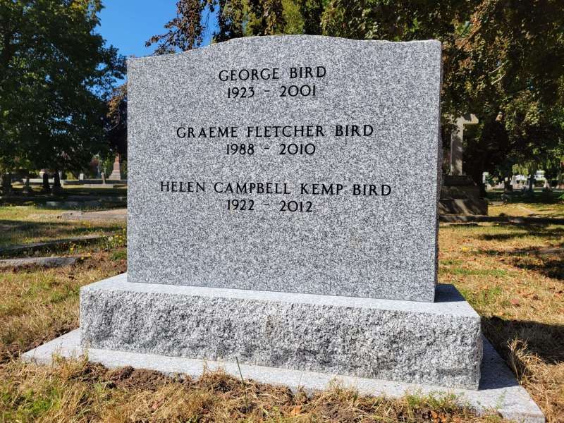 a gravestone for george bird and helen campbell kemp bird
