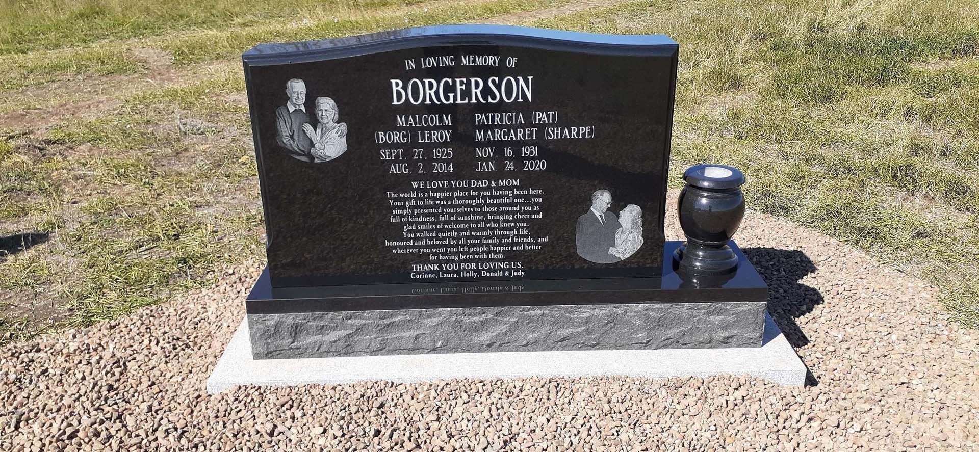 a black gravestone with the name bingerson on it