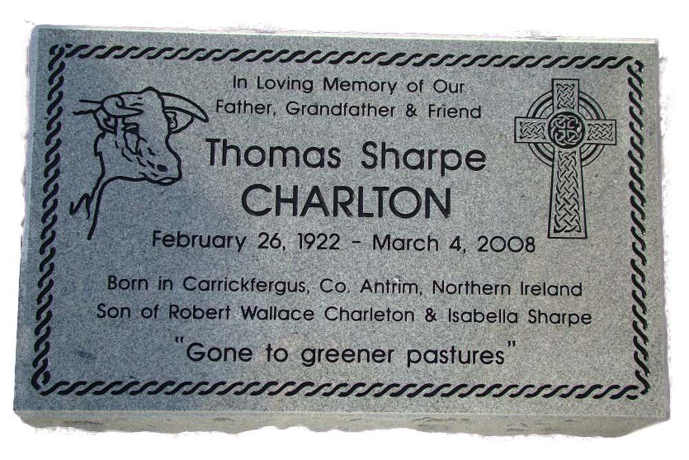 A gravestone for thomas sharpe charlton who died in march 2008