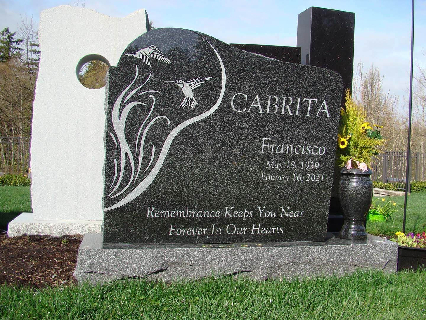 a black and white gravestone with the name cabrita on it