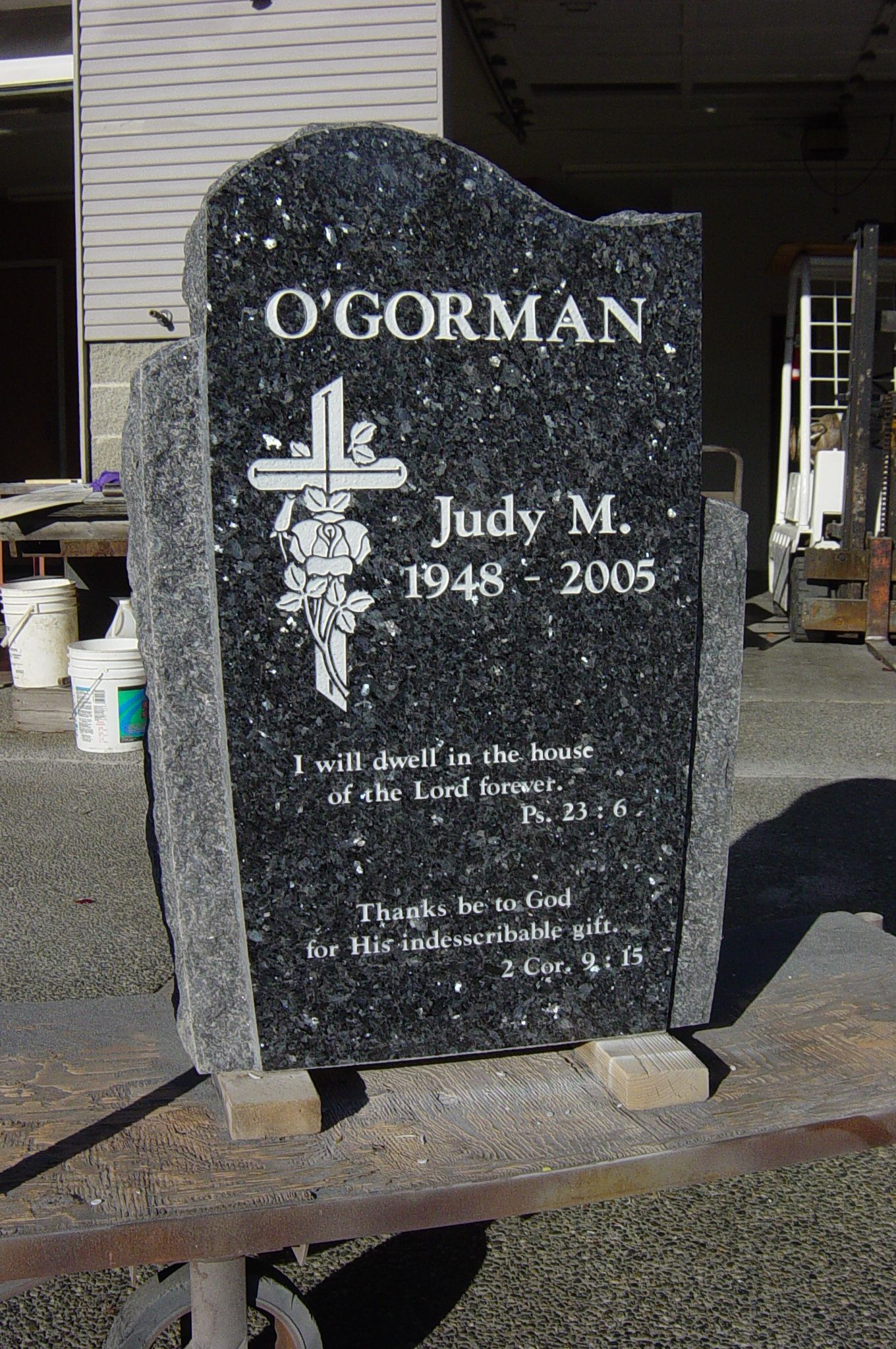 a black gravestone with the name o'gorman on it